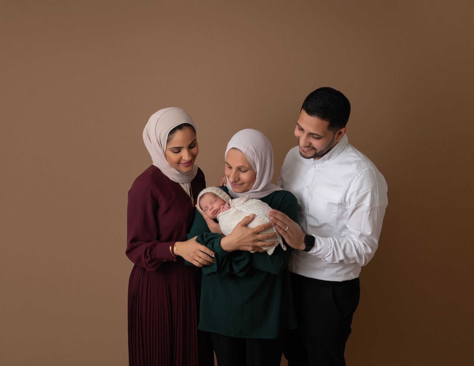 Family with grandmother and the new baby